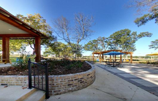 Outdoor courtyard with tables and chairs