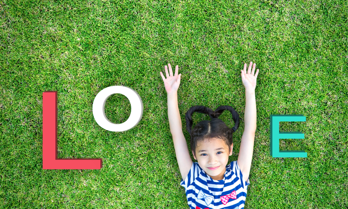 Girl laying on grass